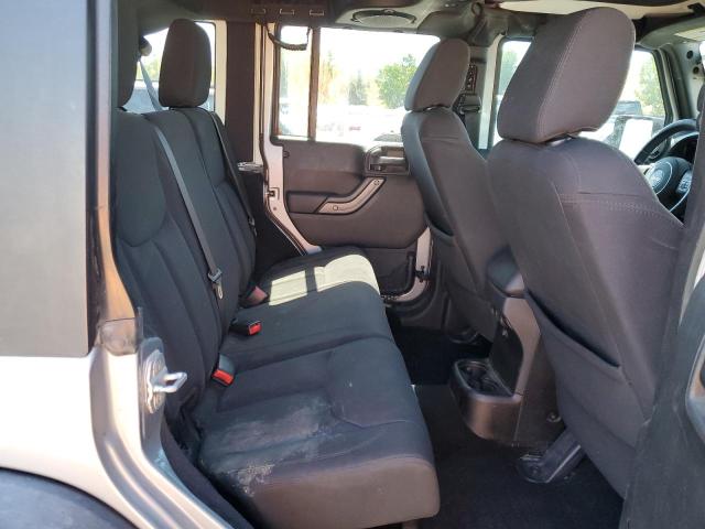 Photo 10 from auction – 2013 JEEP WRANGLER U with VIN 1C4BJWDGXDL658977