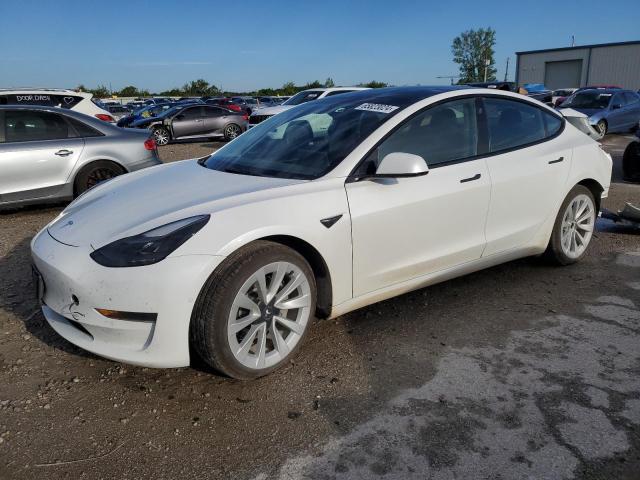 TESLA MODEL 3 2022 with VIN 5YJ3E1EAXNF145707 - Photo from auction