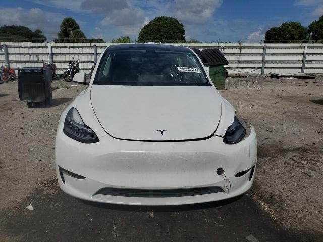 Photo 5 from auction – 2023 TESLA MODEL Y with VIN 7SAYGDEE8PA099768