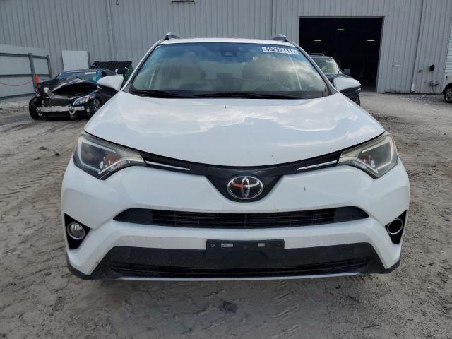 Photo 5 from auction – 2017 TOYOTA RAV4 XLE with VIN JTMRFREV4HJ173038