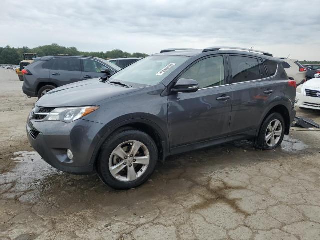 TOYOTA RAV4 XLE 2014 with VIN JTMWFREV0ED028690 - Photo from auction