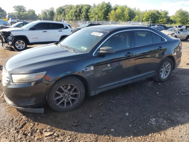 FORD TAURUS SE 2014 with VIN 1FAHP2D84EG154435 - Photo from auction