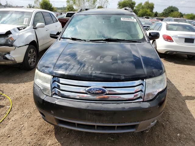 Photo 5 from auction – 2008 FORD TAURUS X S with VIN 1FMDK02W98GA23465