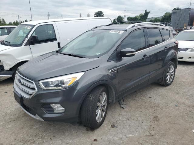 FORD ESCAPE TIT 2018 with VIN 1FMCU9J97JUD04712 - Photo from auction