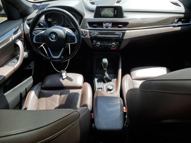 Photo 8 from auction – 2017 BMW X1 XDRIVE2 with VIN WBXHT3C34H5F78740