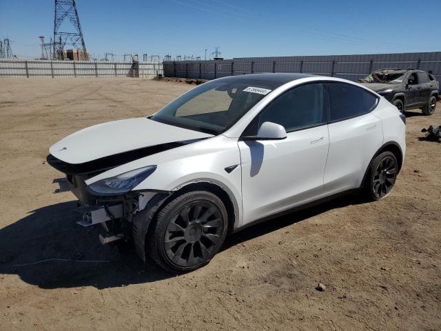 TESLA MODEL Y 2022 with VIN 7SAYGDEE0NF340478 - Photo from auction
