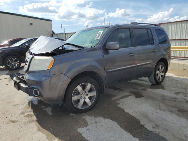 HONDA PILOT TOUR 2014 with VIN 5FNYF3H97EB018249 - Photo from auction
