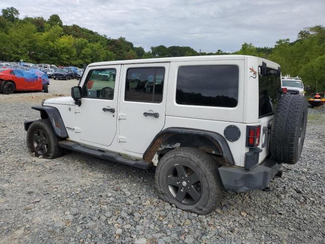 Photo 2 from auction – 2011 JEEP WRANGLER U with VIN 1J4BA3H1XBL615400