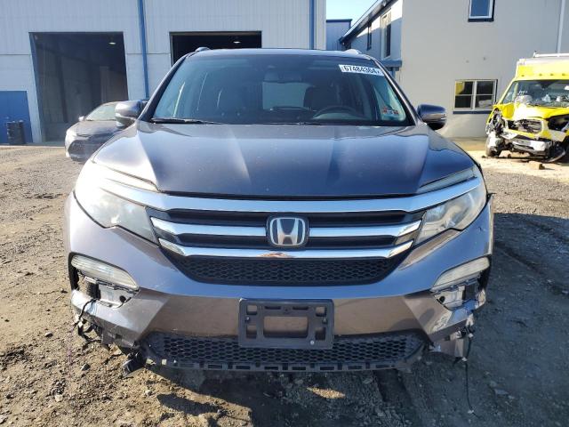 Photo 5 from auction – 2016 HONDA PILOT TOUR with VIN 5FNYF6H99GB035851