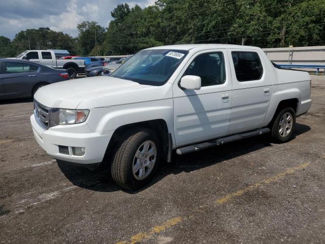 HONDA RIDGELINE 2010 with VIN 5FPYK1F44AB010893 - Photo from auction