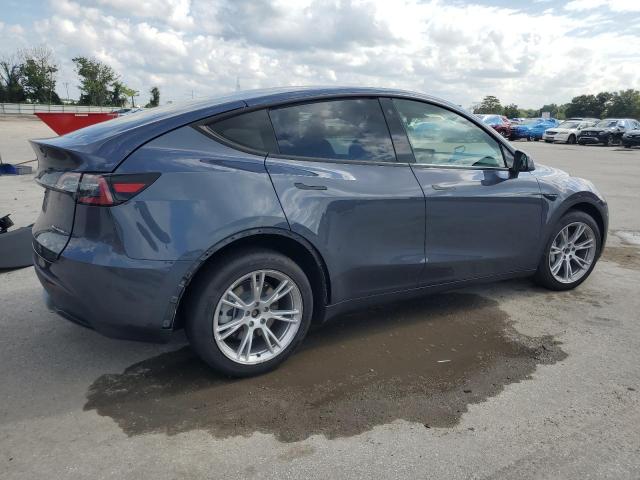 Photo 3 from auction – 2023 TESLA MODEL Y with VIN 7SAYGDEE2PA092329
