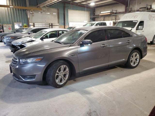 FORD TAURUS SEL 2014 with VIN 1FAHP2E80EG126937 - Photo from auction