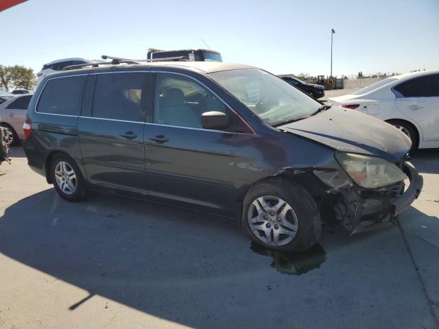 Photo 4 from auction – 2006 HONDA ODYSSEY EX with VIN 5FNRL38446B017675
