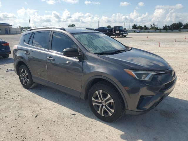 Photo 4 from auction – 2018 TOYOTA RAV4 LE with VIN JTMZFREV2JJ730244