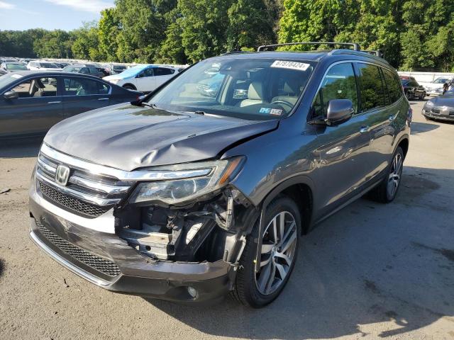 HONDA PILOT ELIT 2016 with VIN 5FNYF6H08GB018931 - Photo from auction