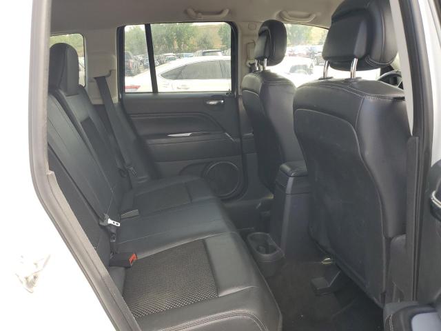 Photo 11 from auction – 2014 JEEP COMPASS LA with VIN 1C4NJDEB5ED693622