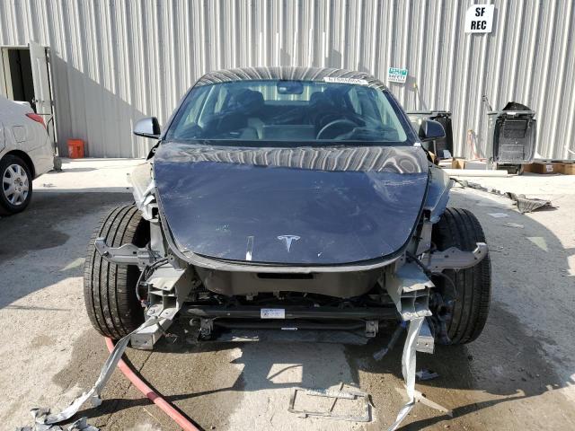 Photo 5 from auction – 2023 TESLA MODEL 3 with VIN 5YJ3E1EB6PF630082