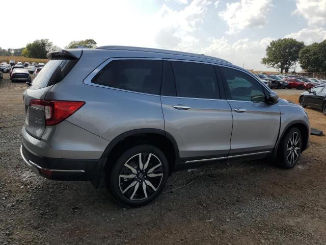 Photo 3 from auction – 2021 HONDA PILOT ELIT with VIN 5FNYF6H03MB072150