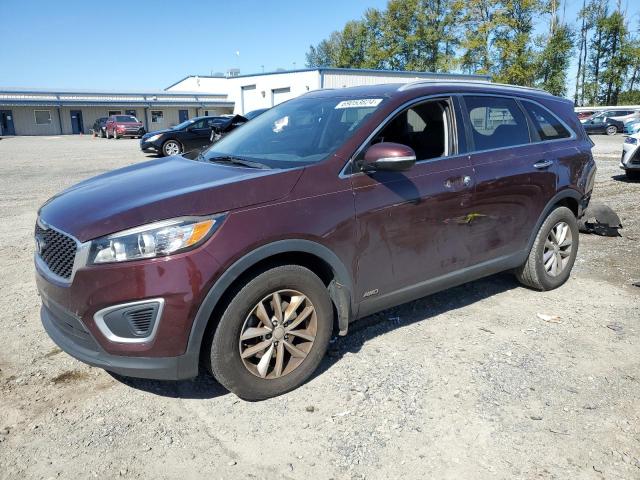 KIA SORENTO LX 2016 with VIN 5XYPGDA34GG140731 - Photo from auction