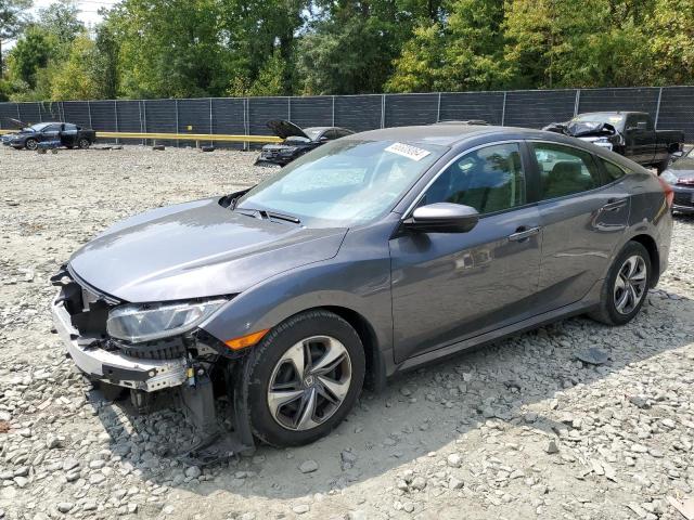 HONDA CIVIC LX 2019 with VIN 2HGFC2F64KH549810 - Photo from auction