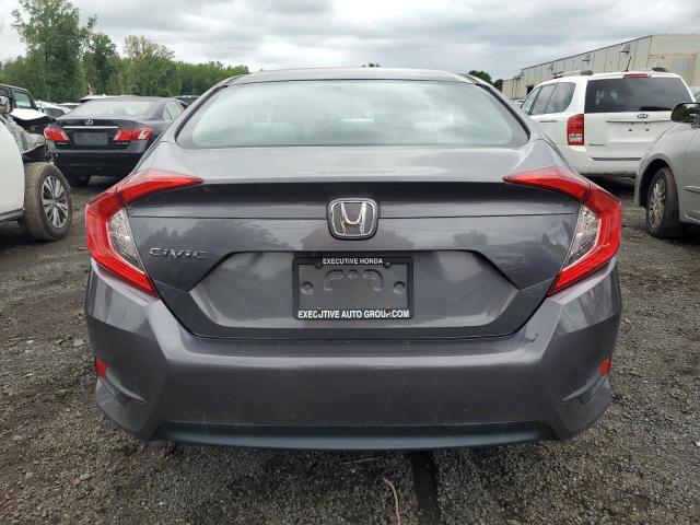 Photo 6 from auction – 2018 HONDA CIVIC LX with VIN 2HGFC2E54JH567487