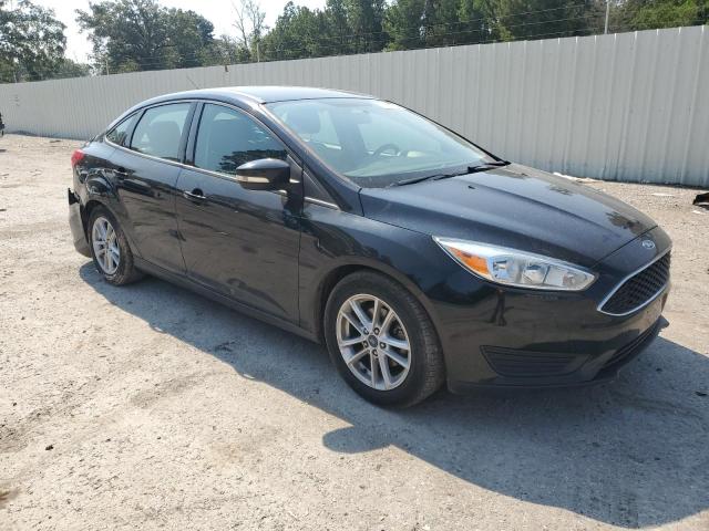 Photo 4 from auction – 2017 FORD FOCUS SE with VIN 1FADP3F21HL294242