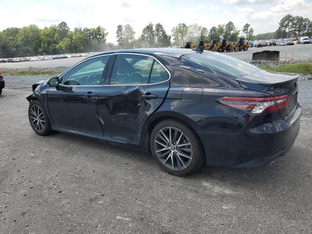 Photo 2 from auction – 2021 TOYOTA CAMRY XLE with VIN 4T1F31AK0MU563003