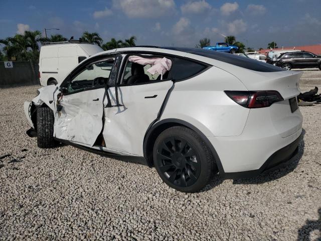 Photo 2 from auction – 2023 TESLA MODEL Y with VIN 7SAYGAEE8PF908350