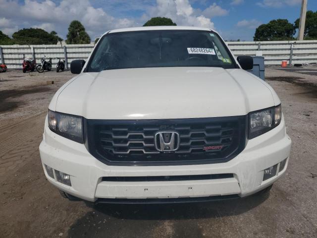Photo 5 from auction – 2013 HONDA RIDGELINE with VIN 5FPYK1F71DB014835