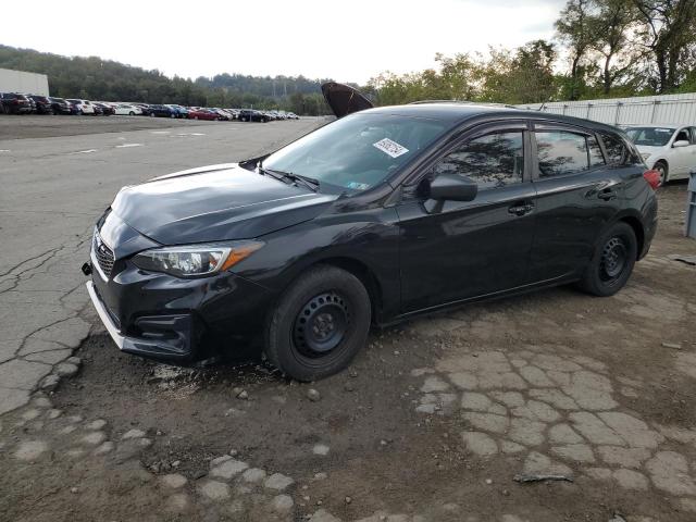 SUBARU IMPREZA 2019 with VIN 4S3GTAB62K3735206 - Photo from auction
