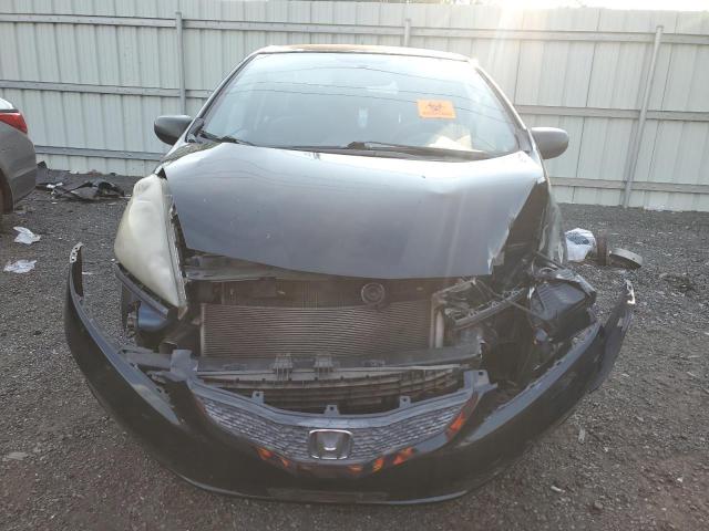 Photo 5 from auction – 2009 HONDA FIT with VIN JHMGE88289S009887