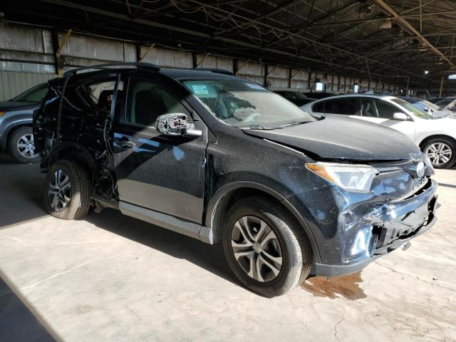 Photo 4 from auction – 2018 TOYOTA RAV4 LE with VIN JTMZFREVXJJ747552