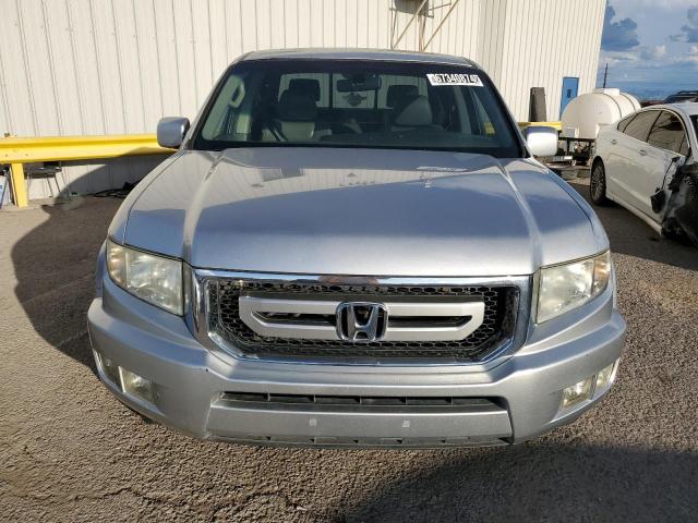 Photo 5 from auction – 2011 HONDA RIDGELINE with VIN 5FPYK1F54BB452583
