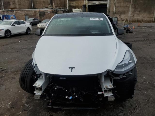 Photo 5 from auction – 2023 TESLA MODEL Y with VIN 7SAYGDEE0PA079529
