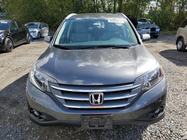 Photo 5 from auction – 2013 HONDA CR-V with VIN 2HKRM4H77DH659089