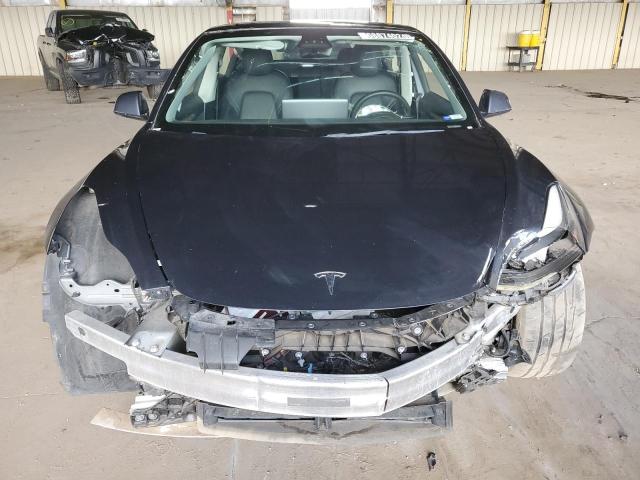 Photo 5 from auction – 2022 TESLA MODEL 3 with VIN 5YJ3E1EB9NF190338