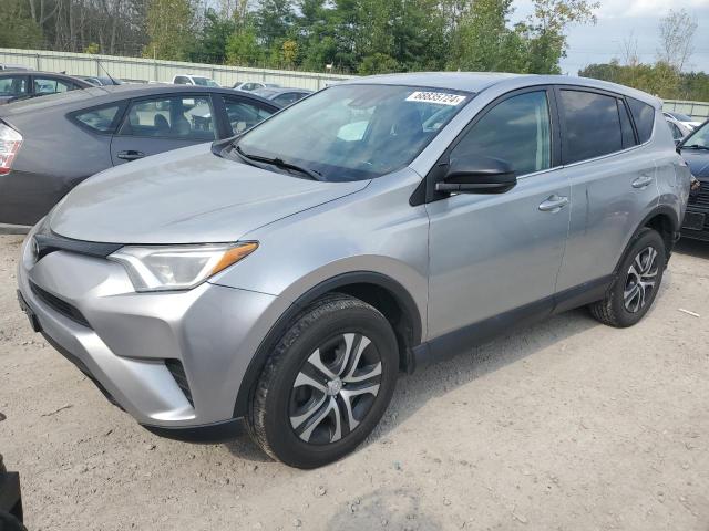 TOYOTA RAV4 LE 2018 with VIN 2T3BFREV2JW763232 - Photo from auction