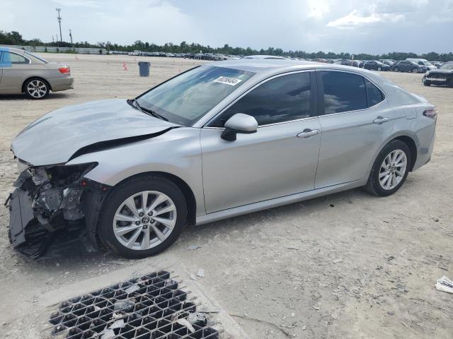 TOYOTA CAMRY LE 2022 with VIN 4T1C11AK2NU632137 - Photo from auction