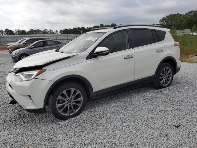 TOYOTA RAV4 LIMIT 2018 with VIN JTMYFREV0JJ160238 - Photo from auction
