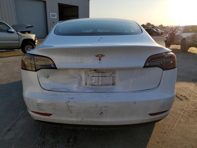 Снимка 6 от търг – 2022 TESLA MODEL 3 с VIN 5YJ3E1EA0NF197105
