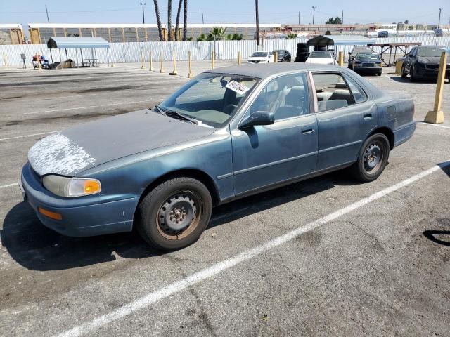 TOYOTA CAMRY LE 1996 with VIN 4T1BF12K6TU869917 - Photo from auction