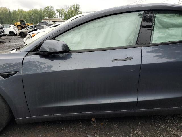 Photo 7 from auction – 2022 TESLA MODEL 3 with VIN 5YJ3E1EA2NF303148