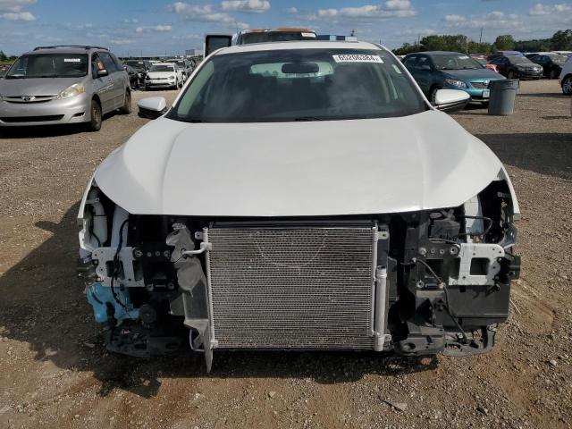 Photo 5 from auction – 2018 HONDA CIVIC EX with VIN 19XFC2F77JE003441