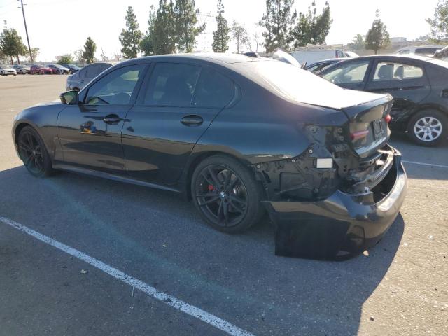 Photo 2 from auction – 2023 BMW 330I with VIN 3MW69FF01P8D59977