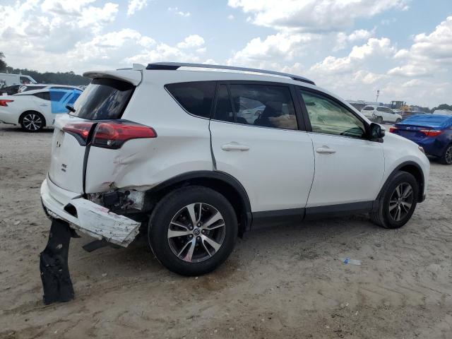 Photo 3 from auction – 2017 TOYOTA RAV4 XLE with VIN JTMRFREV4HJ173038