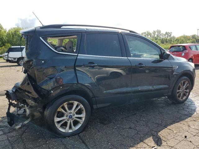 Photo 3 from auction – 2017 FORD ESCAPE SE with VIN 1FMCU9G9XHUC36021