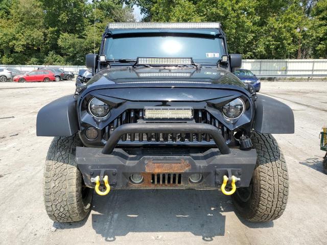 Photo 5 from auction – 2011 JEEP WRANGLER U with VIN 1J4BA3H10BL562240