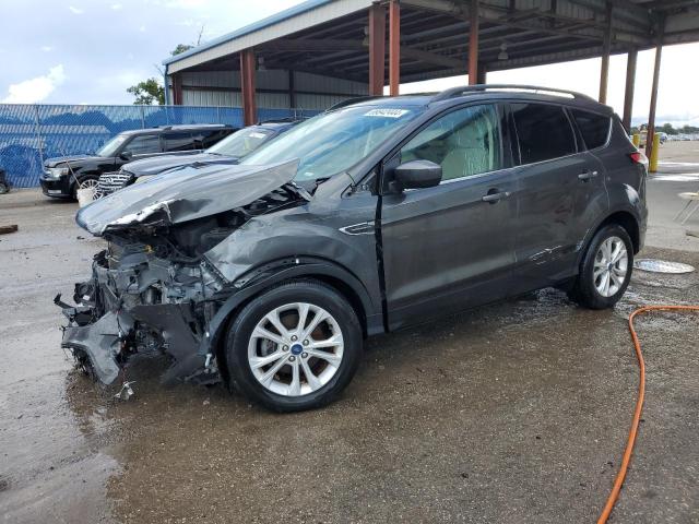 FORD ESCAPE SE 2018 with VIN 1FMCU0GD9JUC36727 - Photo from auction