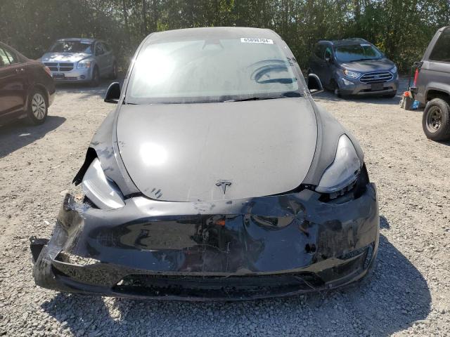 Photo 5 from auction – 2023 TESLA MODEL Y with VIN 7SAYGDEF6PF699619