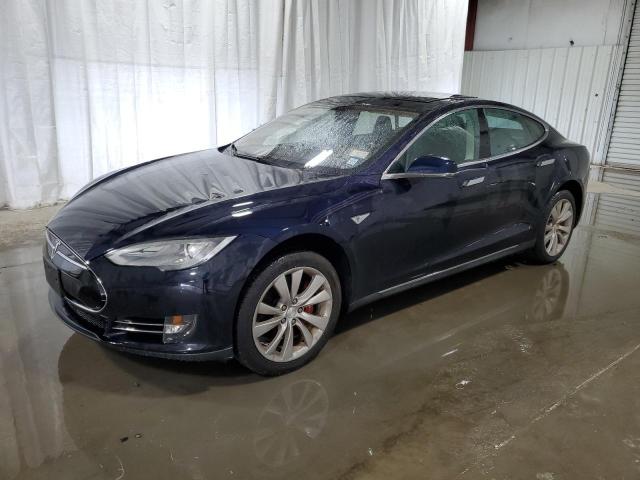 TESLA MODEL S 2014 with VIN 5YJSA1S1XEFP38401 - Photo from auction